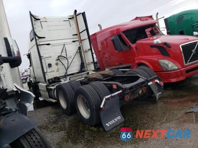 Trzecie zdjęcie samochodu z tyłu: 2012 VOLVO VN VNL VIN:4V4NC9EJ3CN538786 - miniatura