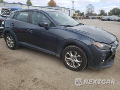 Czwarte zdjęcie samochodu z boku: 2016 MAZDA CX-3 TOURING VIN:JM1DKBC70G0121606 - miniatura