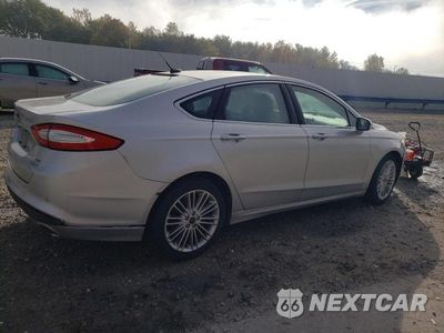 Trzecie zdjęcie samochodu z tyłu: 2016 FORD FUSION SE VIN:3FA6P0HD9GR112373 - miniatura