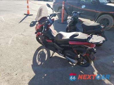 Trzecie zdjęcie samochodu z tyłu: 2013 HONDA PCX 150 VIN:MLHKF1210D5005238 - miniatura