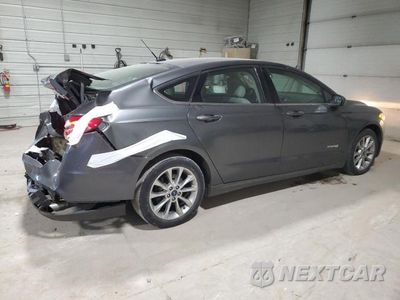 Trzecie zdjęcie samochodu z tyłu: 2017 FORD FUSION SE HYBRID VIN:3FA6P0LU2HR238650 - miniatura