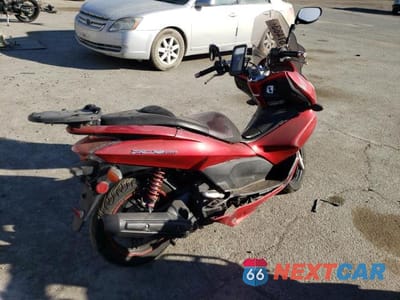 Czwarte zdjęcie samochodu z boku: 2013 HONDA PCX 150 VIN:MLHKF1210D5005238 - miniatura