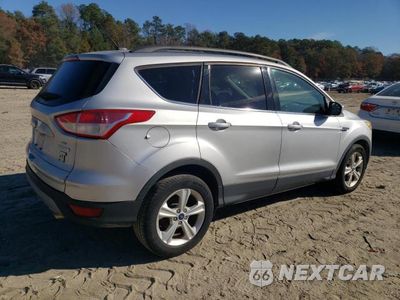 Trzecie zdjęcie samochodu z tyłu: 2014 FORD ESCAPE SE VIN:1FMCU0GX0EUC64304 - miniatura