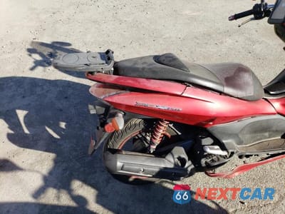 Zdjęcie 6 z 10 samochodu: 2013 HONDA PCX 150 VIN:MLHKF1210D5005238 - miniatura