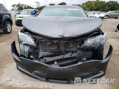 Piąte zdjęcie samochodu w środku: 2014 TOYOTA CAMRY L VIN:4T1BF1FK7EU333734 - miniatura