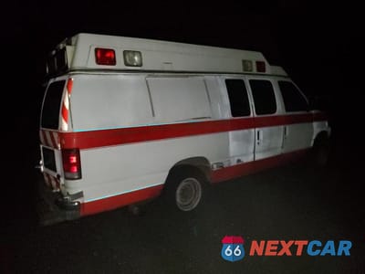 Trzecie zdjęcie samochodu z tyłu: 2001 FORD ECONOLINE E350 SUPER DUTY VAN VIN:1FDSS34F41HA80887 - miniatura