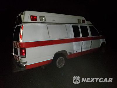 Trzecie zdjęcie samochodu z tyłu: 2001 FORD ECONOLINE E350 SUPER DUTY VAN VIN:1FDSS34F41HA80887 - miniatura