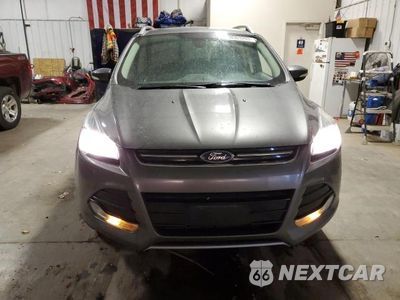 Piąte zdjęcie samochodu w środku: 2014 FORD ESCAPE TITANIUM VIN:1FMCU9J92EUD58814 - miniatura