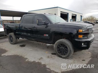 Czwarte zdjęcie samochodu z boku: 2016 CHEVROLET SILVERADO K2500 HEAVY DUTY LT VIN:1GC1KVEG6GF246432 - miniatura