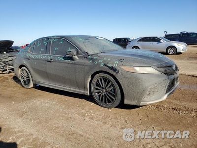 Czwarte zdjęcie samochodu z boku: 2021 TOYOTA CAMRY XSE VIN:4T1K31AK9MU561569 - miniatura