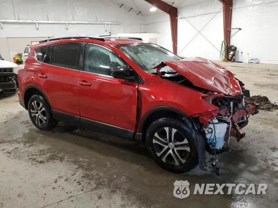 Czwarte zdjęcie samochodu z boku: 2017 TOYOTA RAV4 LE VIN:2T3BFREV1HW577384 - miniatura