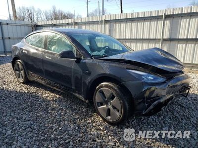 Czwarte zdjęcie samochodu z boku: 2023 TESLA MODEL 3 VIN:5YJ3E1EBXPF594025 - miniatura