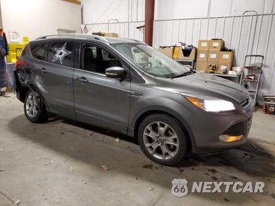 Czwarte zdjęcie samochodu z boku: 2014 FORD ESCAPE TITANIUM VIN:1FMCU9J92EUD58814 - miniatura