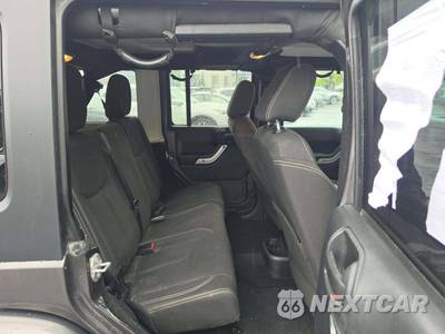 2016 Jeep Wrangler Unlimited Sahara - zdjęcie 16 z 23 - miniatura