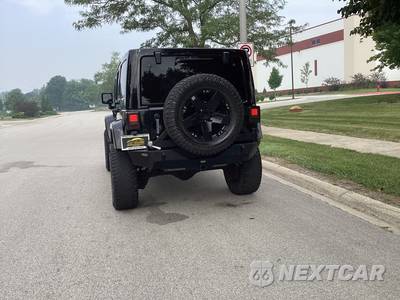 2014 Jeep Wrangler Unlimited Sahara - zdjęcie 6 z 17 - miniatura