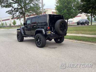 2014 Jeep Wrangler Unlimited Sahara - zdjęcie 7 z 17 - miniatura