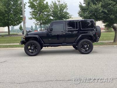 2014 Jeep Wrangler Unlimited Sahara - zdjęcie 8 z 17 - miniatura