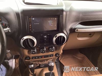 2014 Jeep Wrangler Unlimited Sahara - zdjęcie 16 z 17 - miniatura